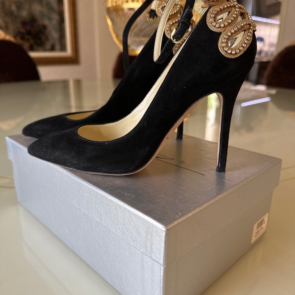 Black suede pumps